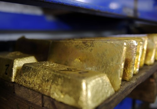 Is it better to buy gold stock or physical gold?